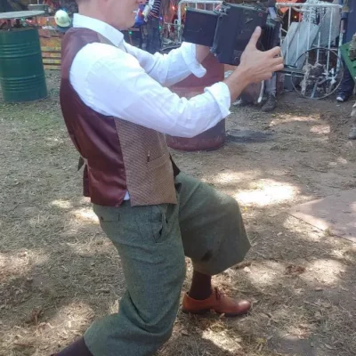 Fotograf mit Graflex Kamera